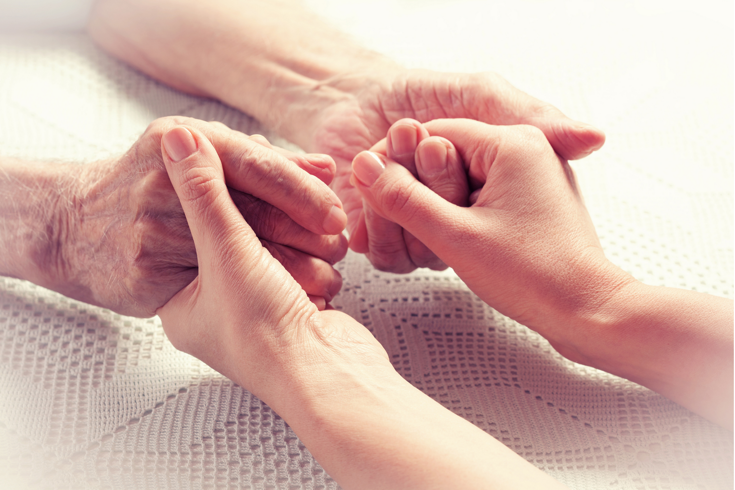 Short term home health care needds met | imgae of sennior hands holding younger hands